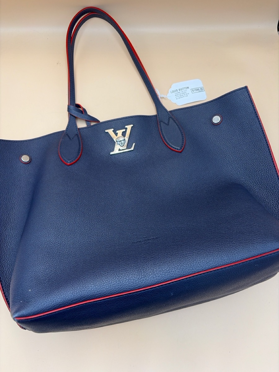 Wednesday Oct 7 – Handbag: Louis Vuitton Model LockMe Go Tote, Serial Number , Blue, Handbag, 17″WX12″HX6″D – $1,599